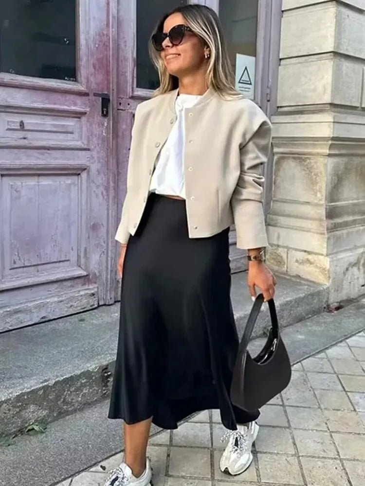 Falda midi Anais de satén negro y talle alto