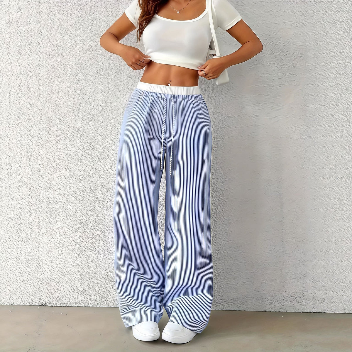 Pantalones casuales Beatrice de corte recto y a rayas