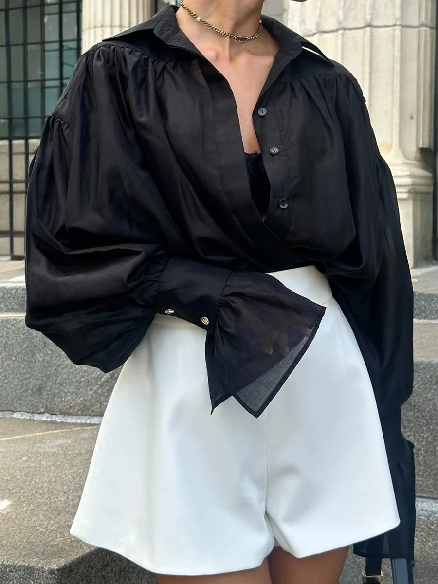 Blusa transparente con botones Brielle