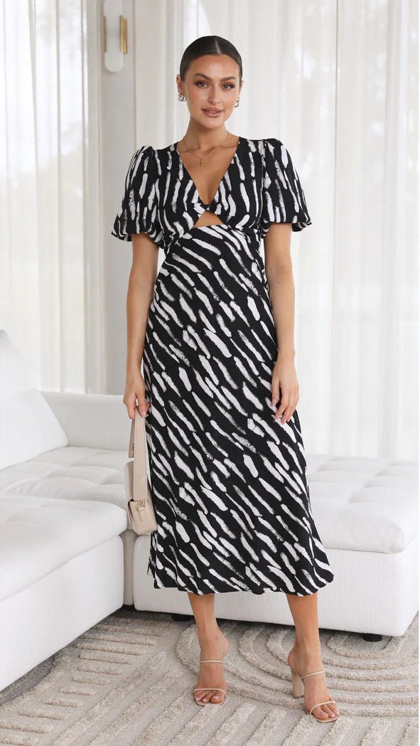 Vestido midi de línea A con estampado y escote en V Brooke