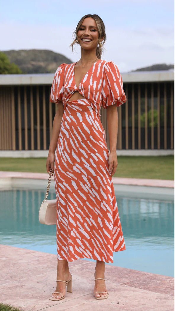 Vestido midi de línea A con estampado y escote en V Brooke