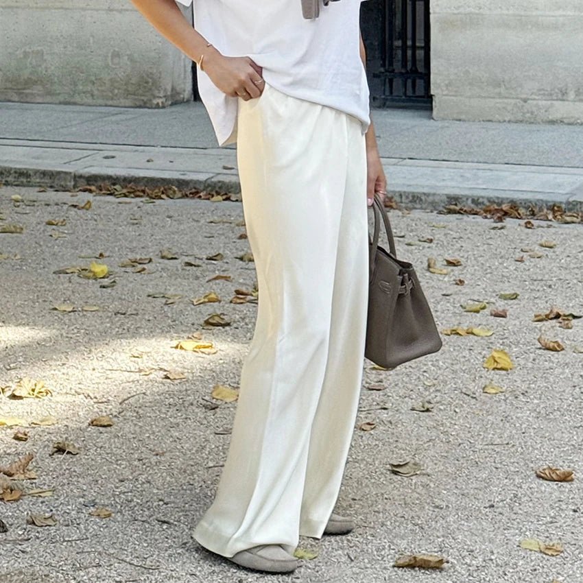 Pantalones Cameron de pierna acampanada y satén