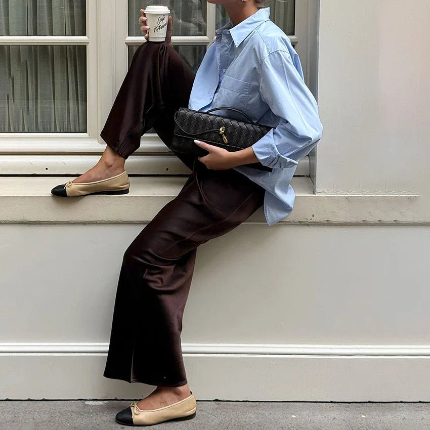 Pantalones Cameron de pierna acampanada y satén