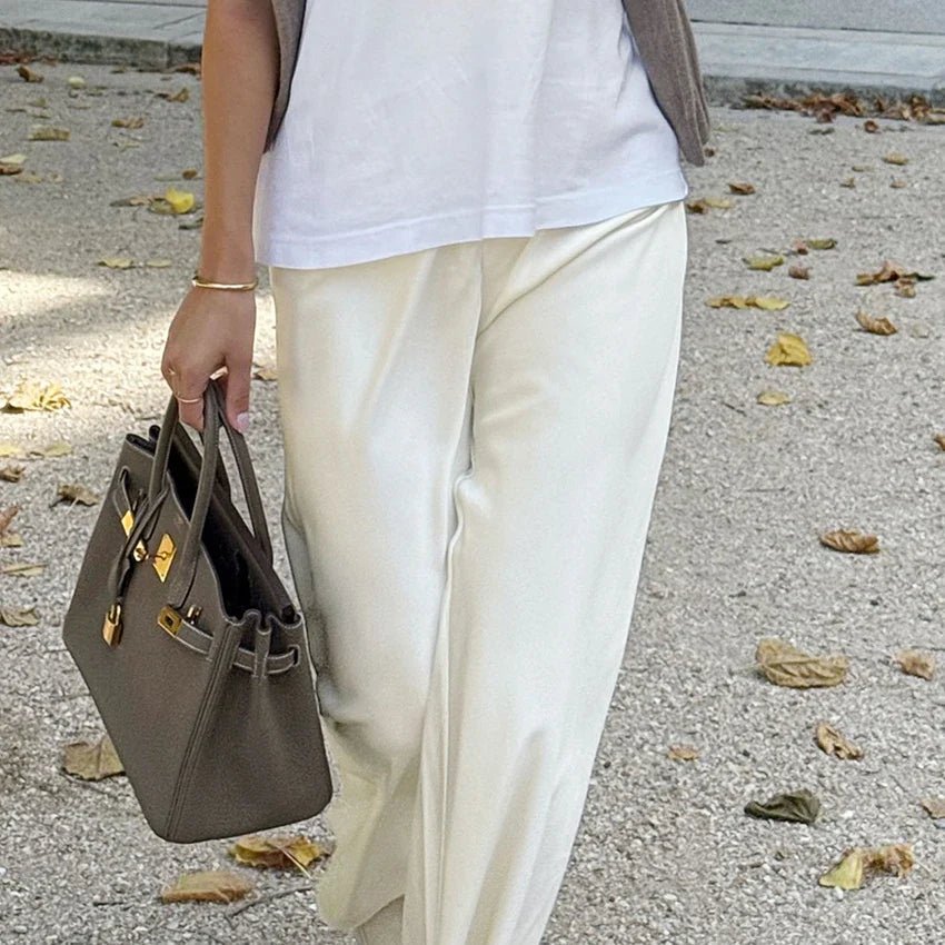 Pantalones Cameron de pierna acampanada y satén