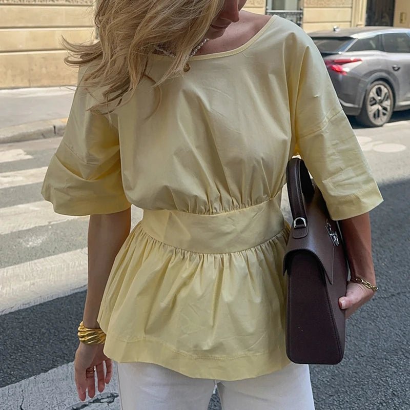 Blusa sin espalda con volantes Cecile