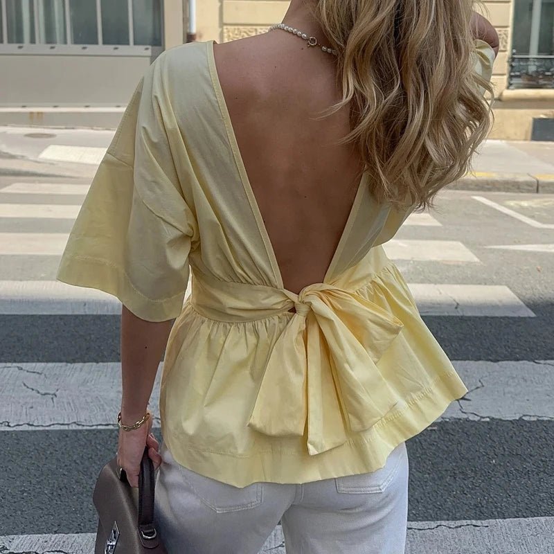 Blusa sin espalda con volantes Cecile