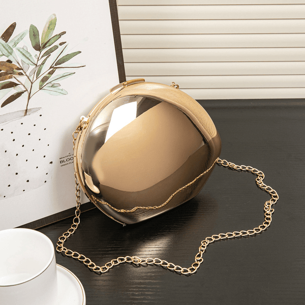 Clutch de noche con forma de concha Celeste