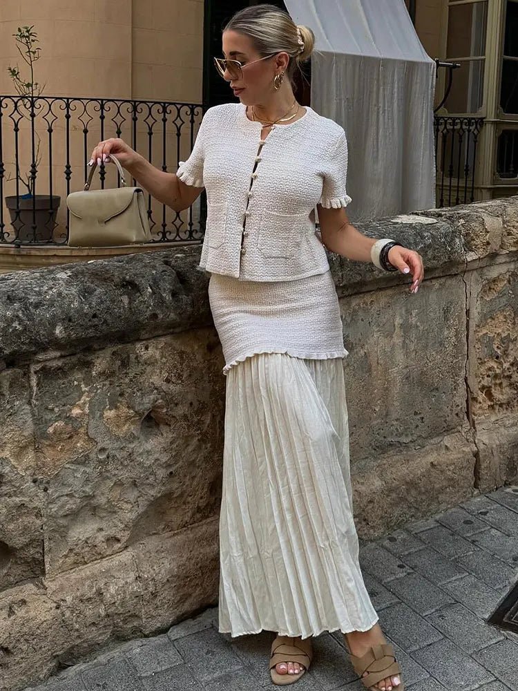 Conjunto Claudia de top de punto de tirantes y falda plisada
