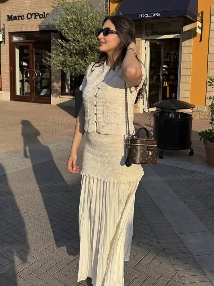 Conjunto Claudia de top de punto de tirantes y falda plisada