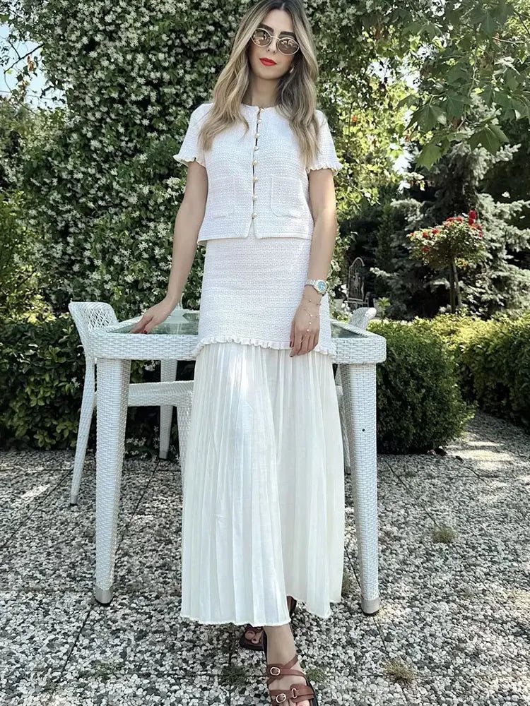 Conjunto Claudia de top de punto de tirantes y falda plisada
