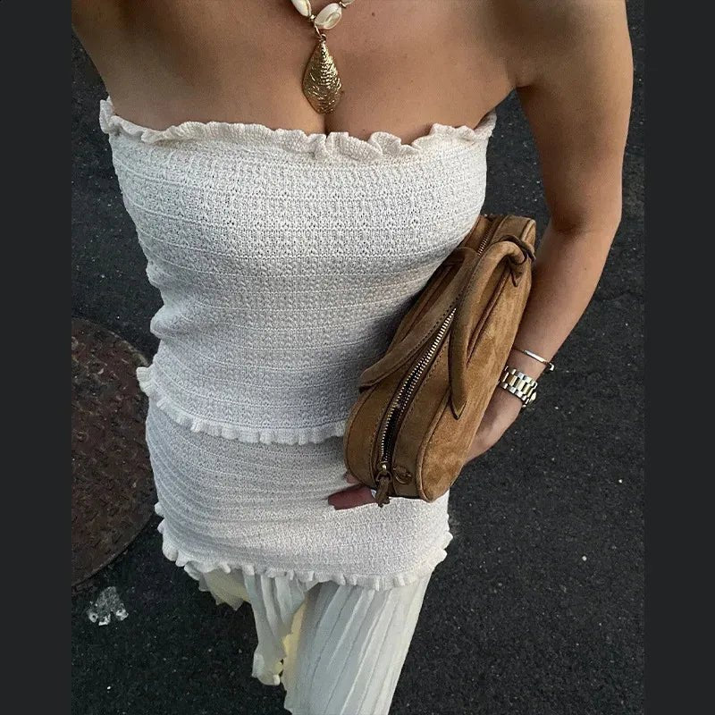 Conjunto Claudia de top de punto de tirantes y falda plisada