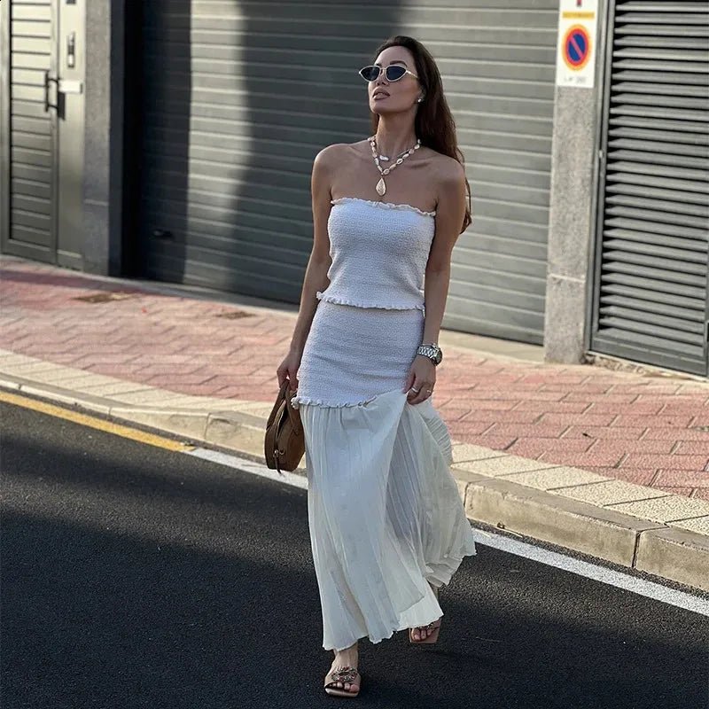 Conjunto Claudia de top de punto de tirantes y falda plisada