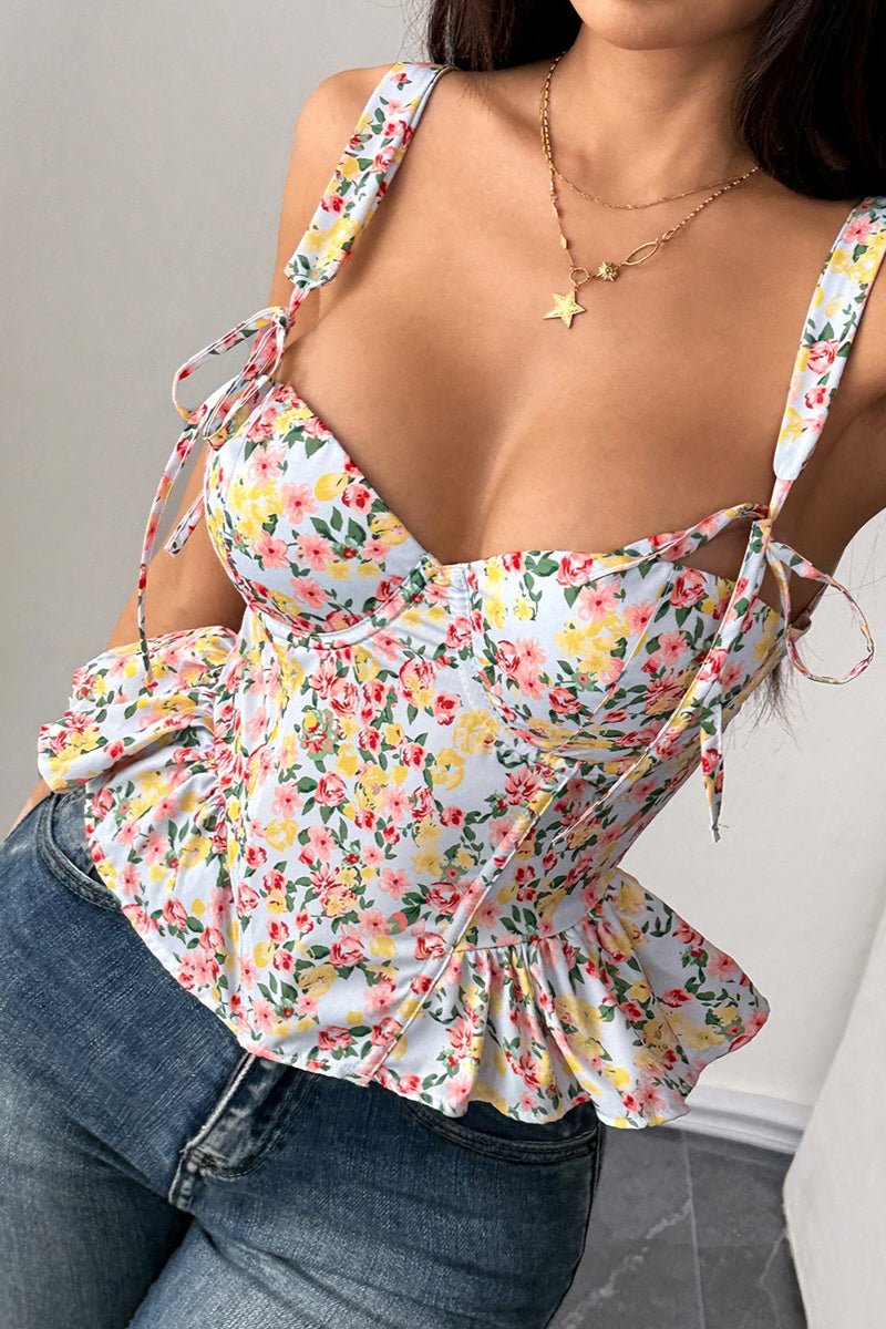 Top de tirantes Elara con peplum floral
