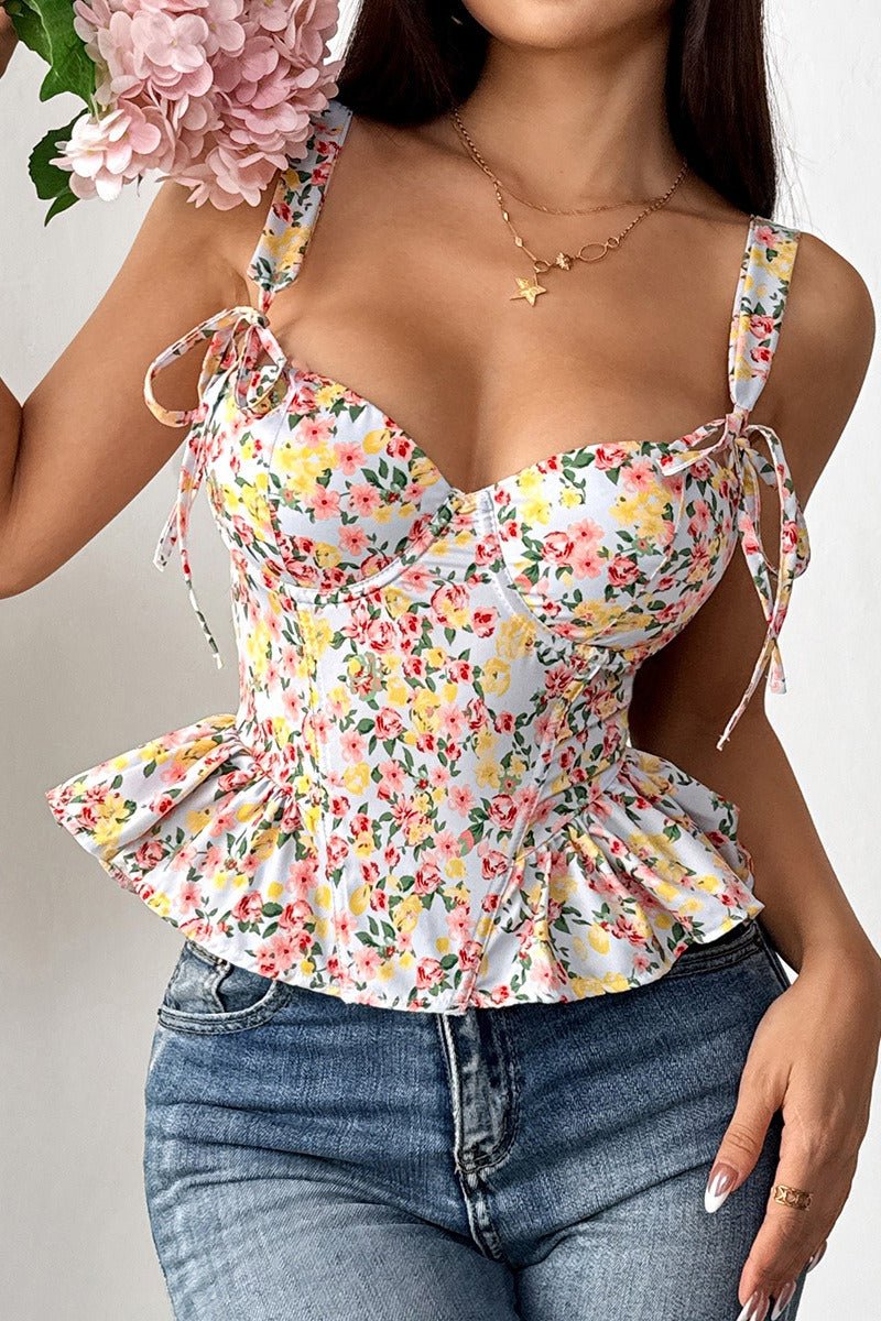 Top de tirantes Elara con peplum floral