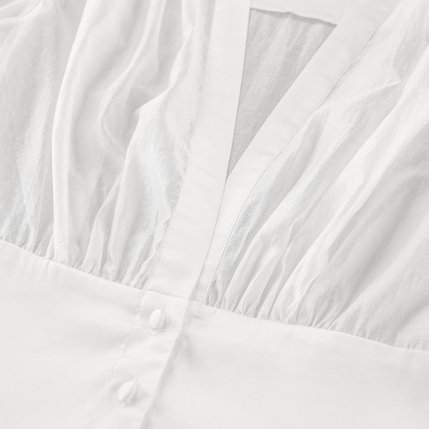 Blusa transparente abotonada con escote pronunciado Elisa