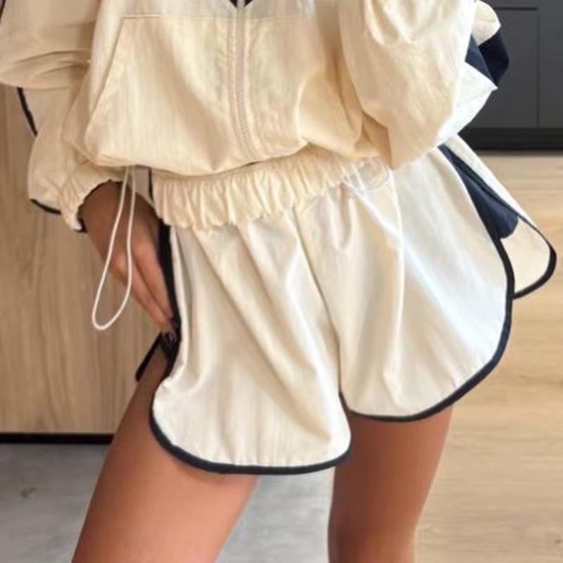 Conjunto de cortavientos y shorts con estampado de chevrones Ellen