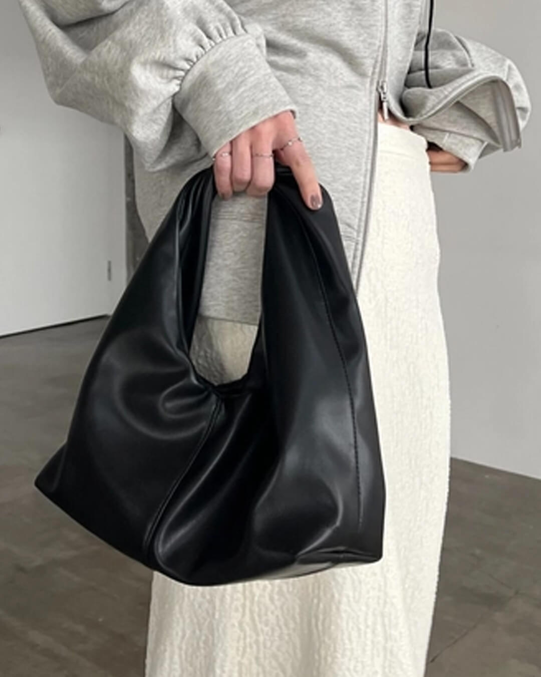 Bolso de mano de cuero Gelyn