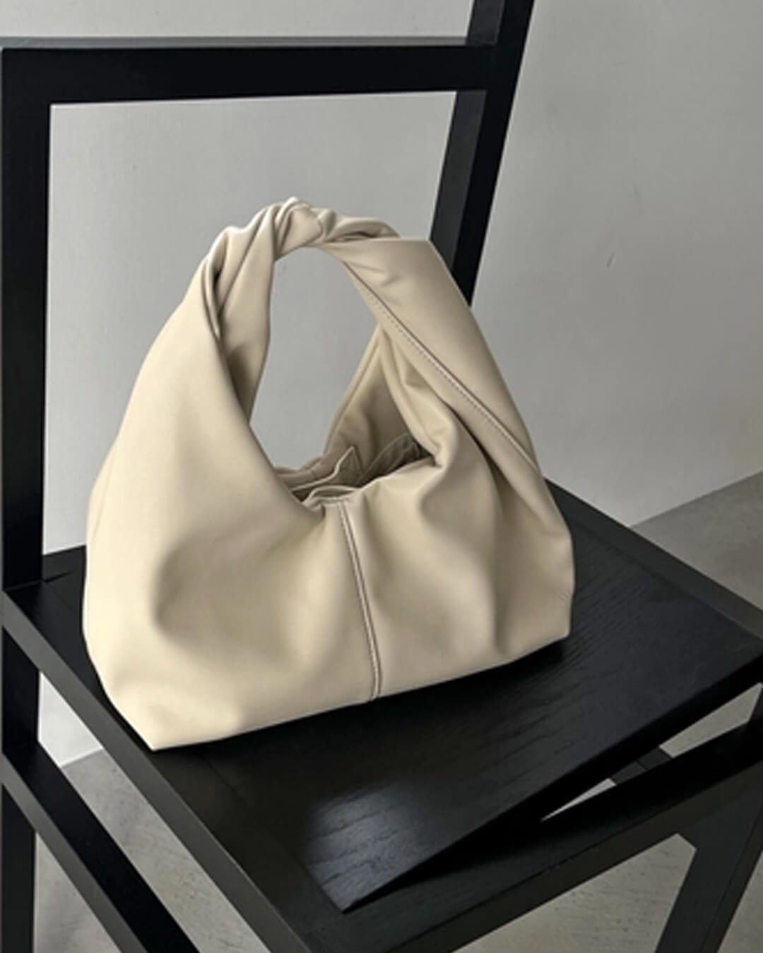 Bolso de mano de cuero Gelyn