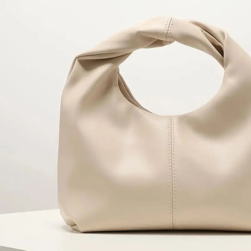 Bolso de mano de cuero Gelyn