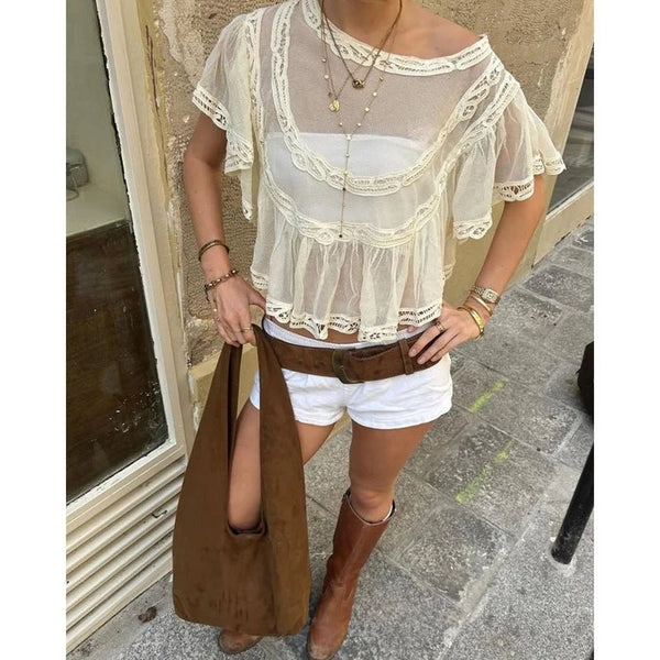 Blusa de gasa transparente Genevra