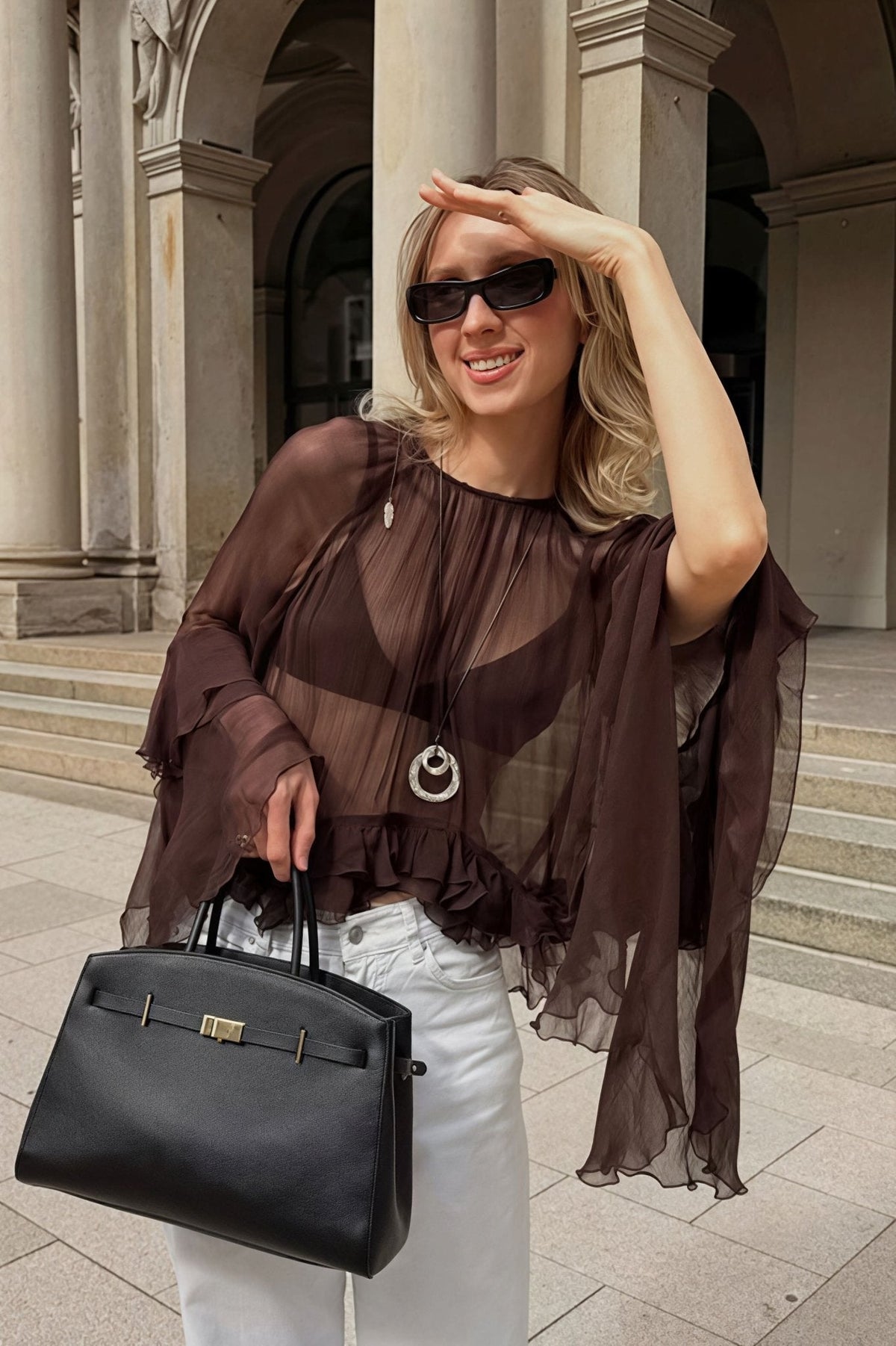Blusa de gasa Greta con mangas acampanadas y volantes
