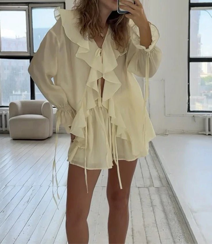 Conjunto de top con lazos y volantes y shorts Hannah