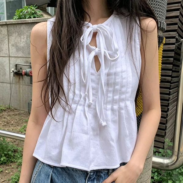 Top Honora con bajo de volantes y lazo delantero