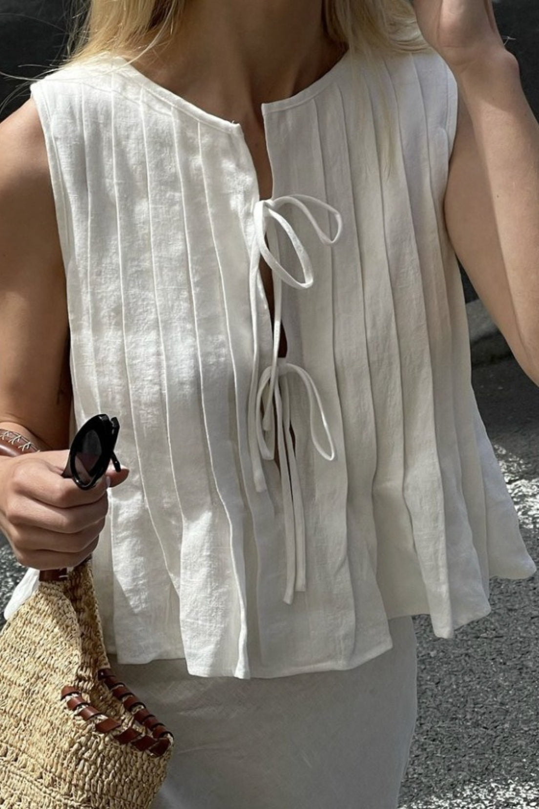 Top Honora con bajo de volantes y lazo delantero