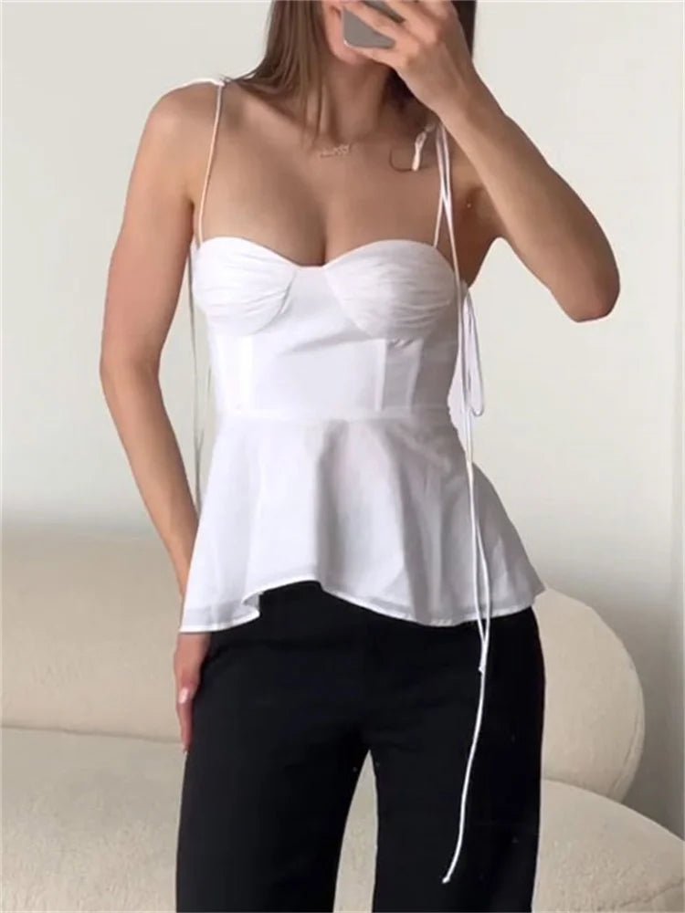 Top de tirantes con corsé y peplum Jada