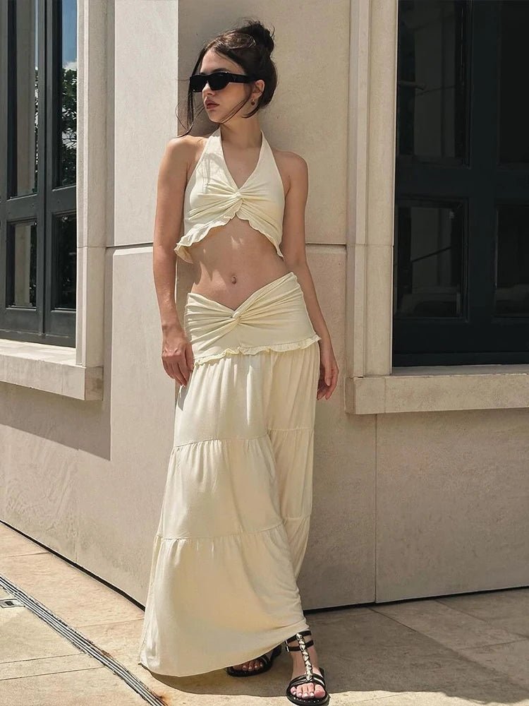 Conjunto de top corto halter y falda plisada Jane
