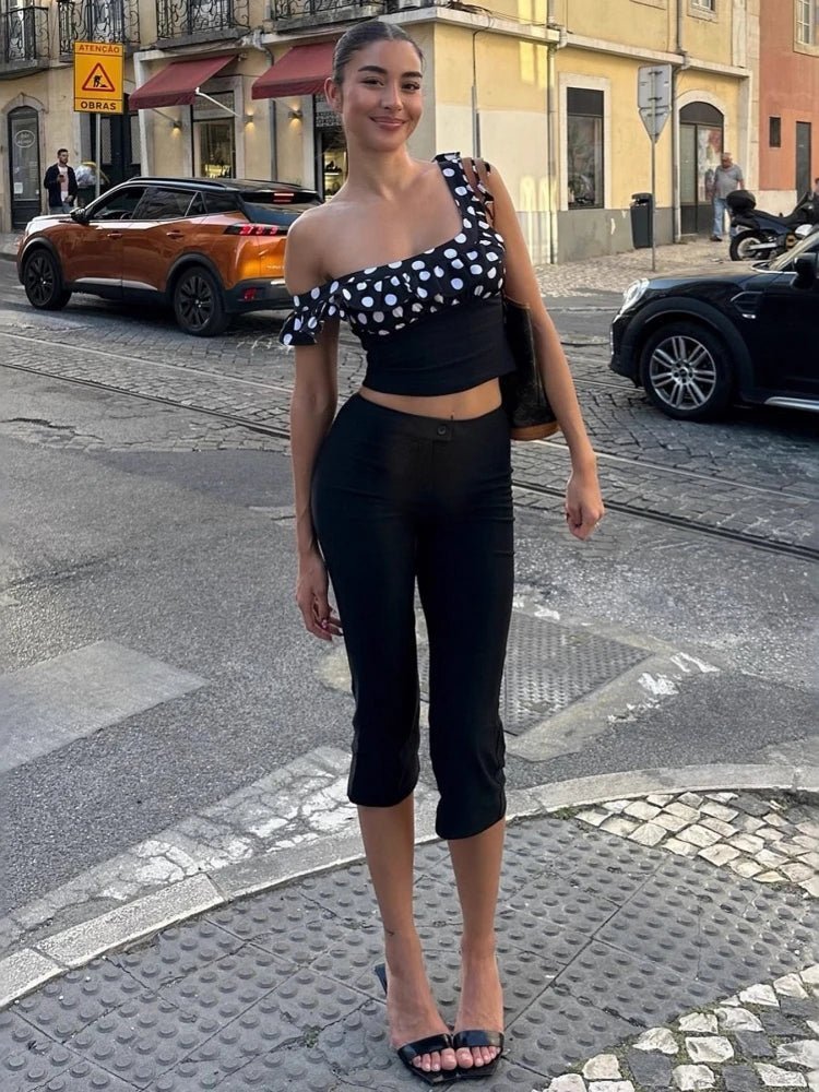 Pantalones capri negros Juliette