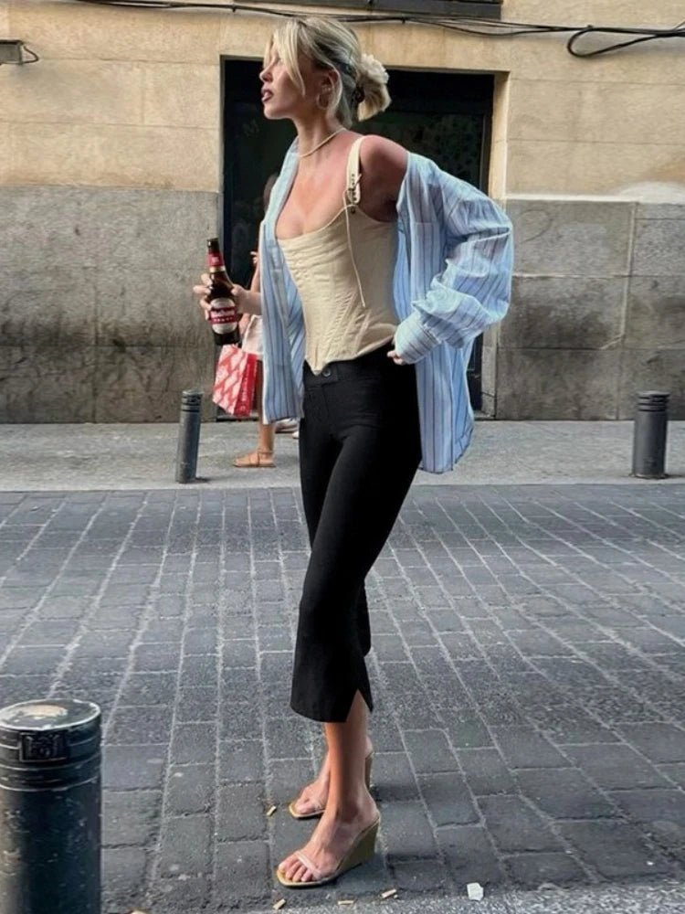 Pantalones capri negros Juliette