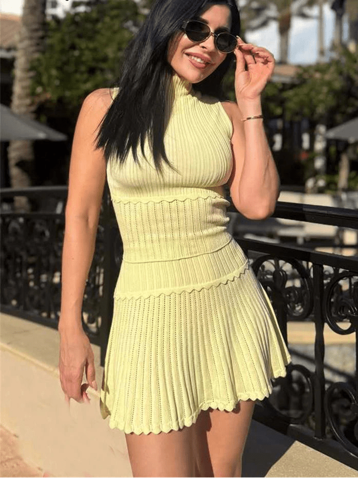 Conjunto de dos piezas de top corto de punto y minifalda plisada Kelly