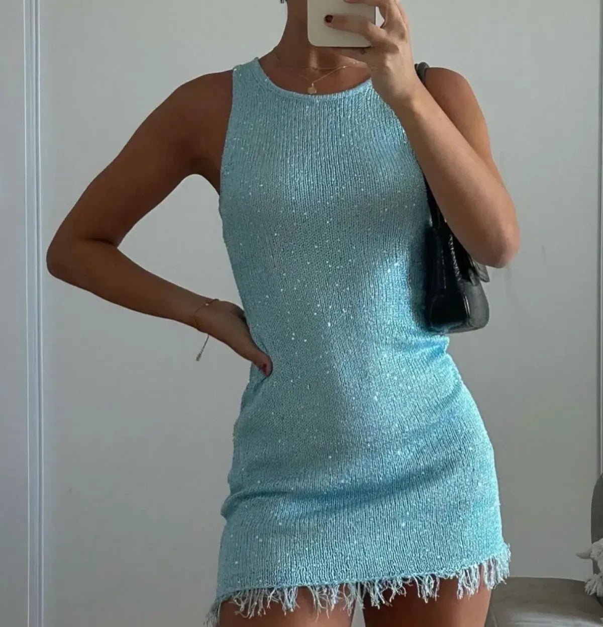Minivestido corto semitransparente sin mangas Lia