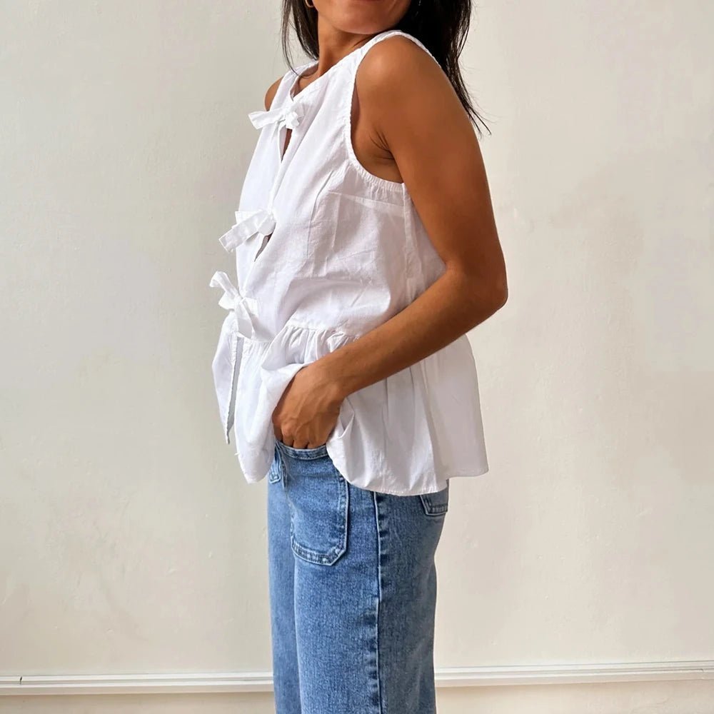 Top de tirantes peplum Lisette con lazo