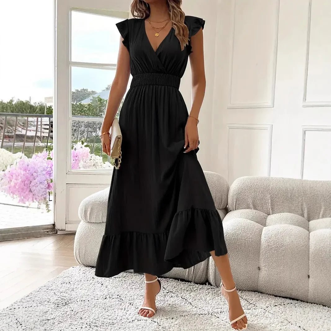 Vestido negro vaporoso con escote en V y volantes Livia