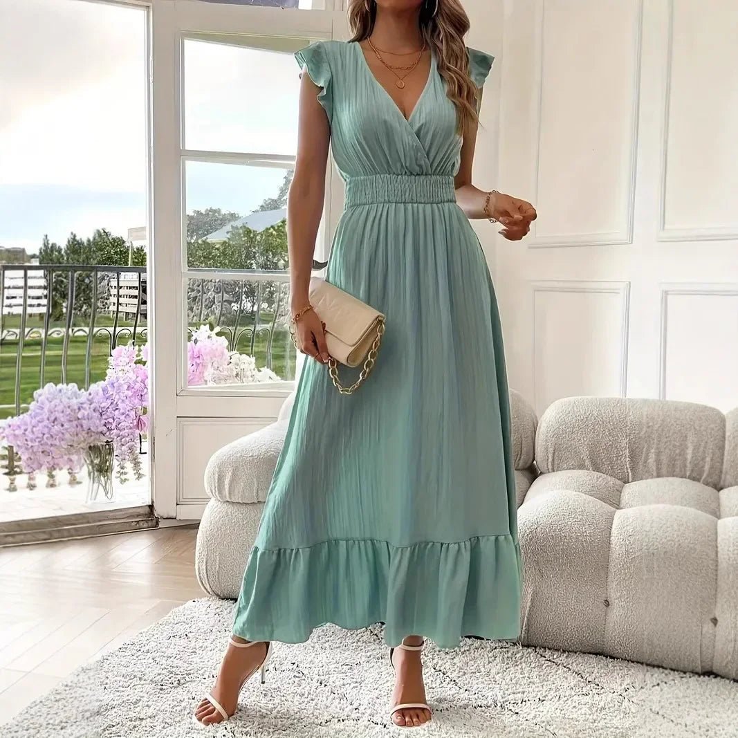 Vestido negro vaporoso con escote en V y volantes Livia