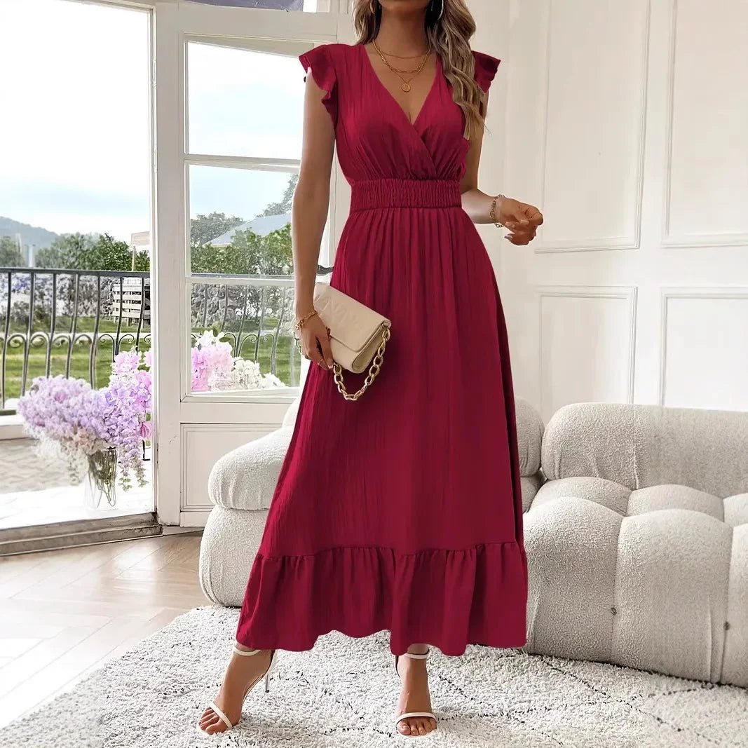 Vestido negro vaporoso con escote en V y volantes Livia
