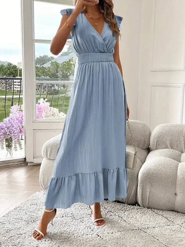 Vestido negro vaporoso con escote en V y volantes Livia