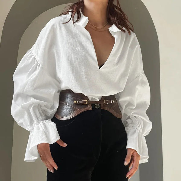 Blusa de manga larga abullonada con cuello de pico Lola