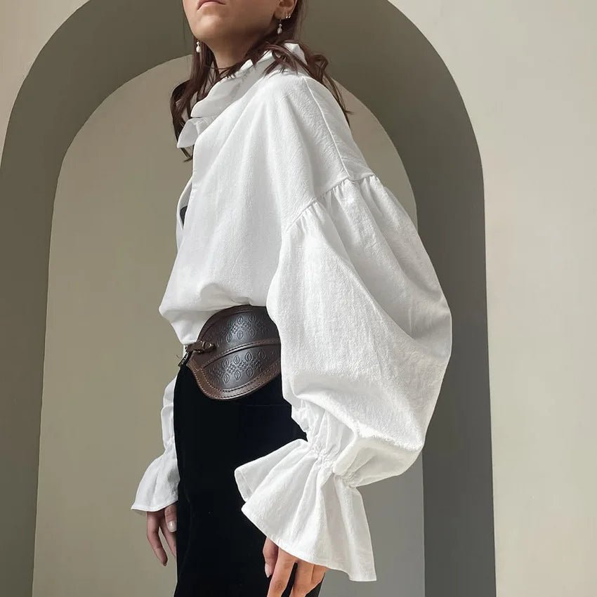 Blusa de manga larga abullonada con cuello de pico Lola