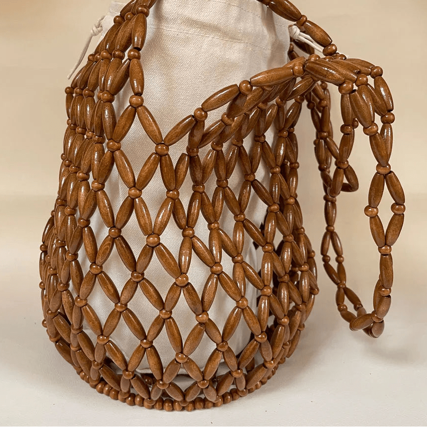 Bolso de mano tejido con cuentas Margot