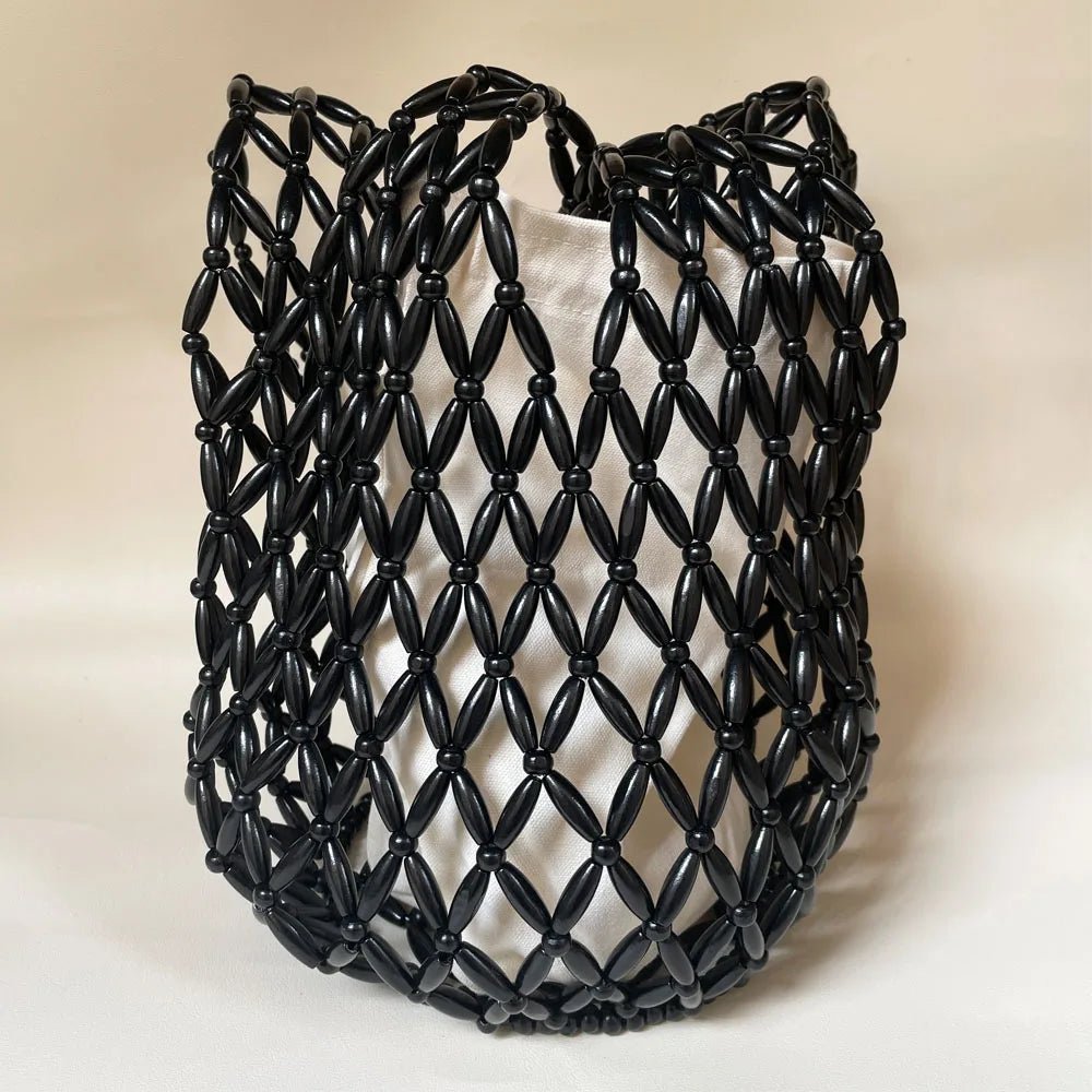 Bolso de mano tejido con cuentas Margot