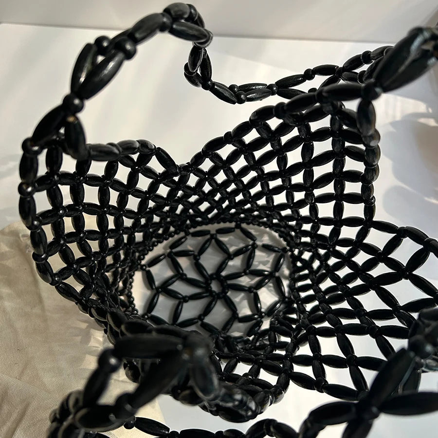 Bolso de mano tejido con cuentas Margot