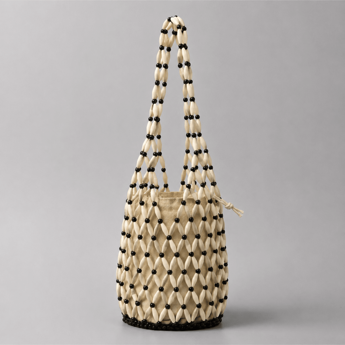 Bolso de mano tejido con cuentas Margot