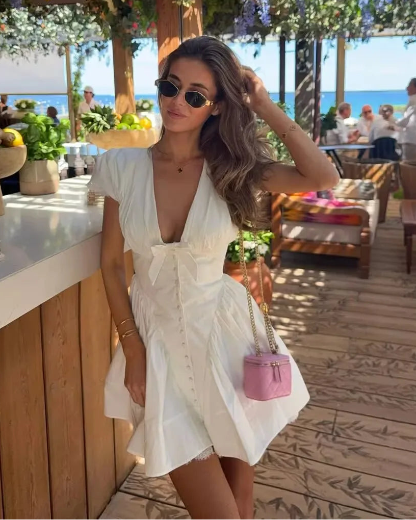 Minivestido con lazo y escote en V Mia