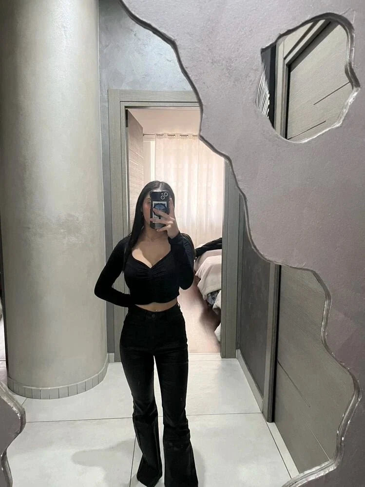 Pantalones acampanados de cuero sintético Michelle