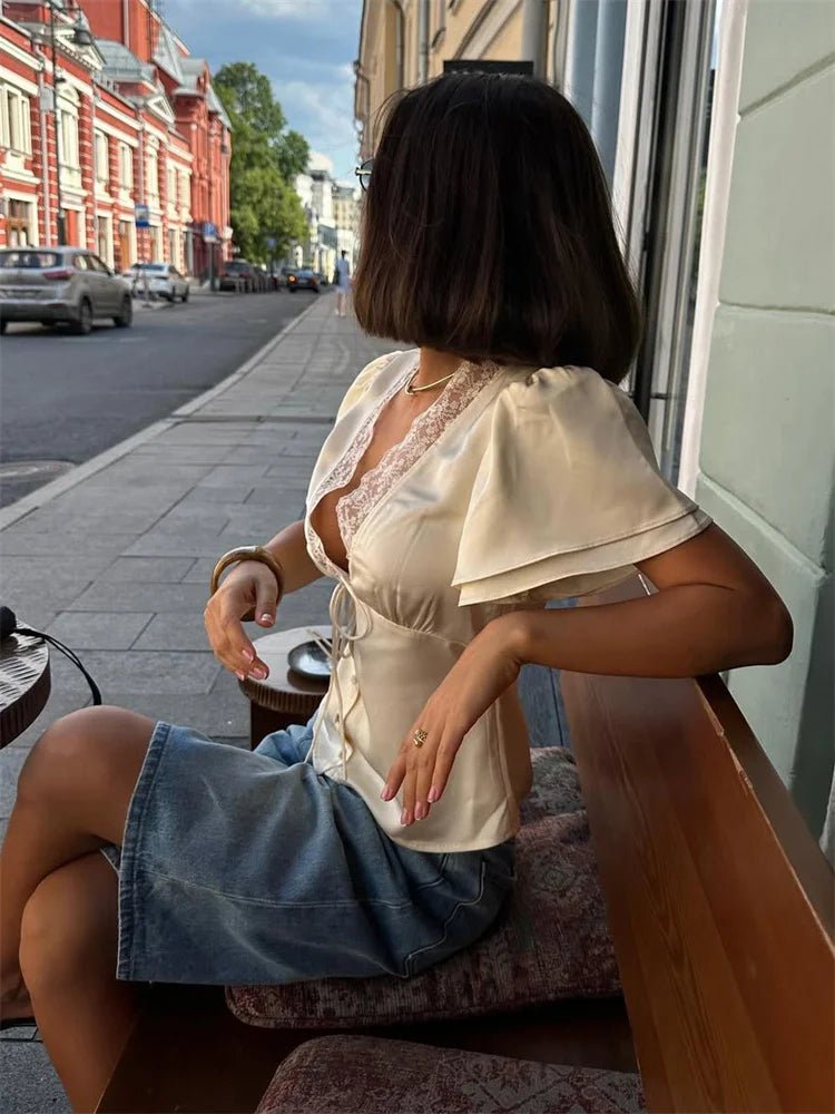 Blusa de satén con encaje Nathalie