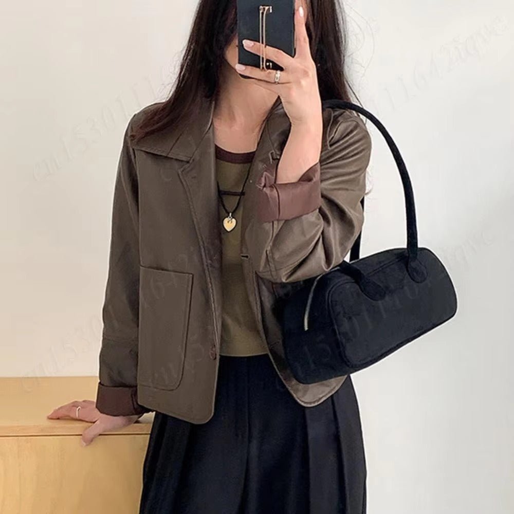 Bolso baguette de ante Pauleen