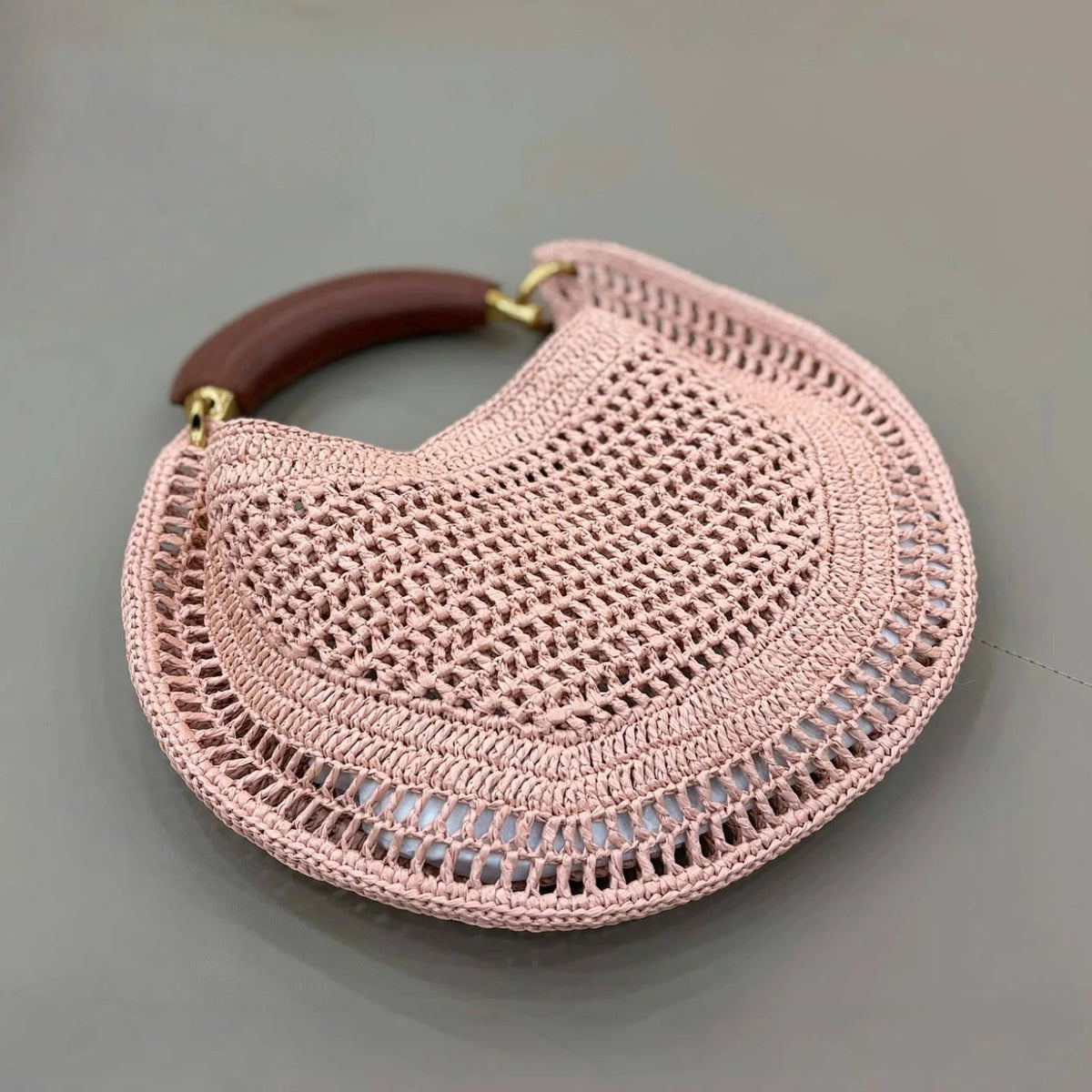Bolso tejido de media luna Sabine